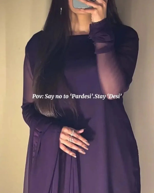 Person wearing a purple dress with text overlay on a plain background